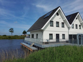 Nr 110 - Ferienhaus Seeperle Pfahlhaus auf der Harle